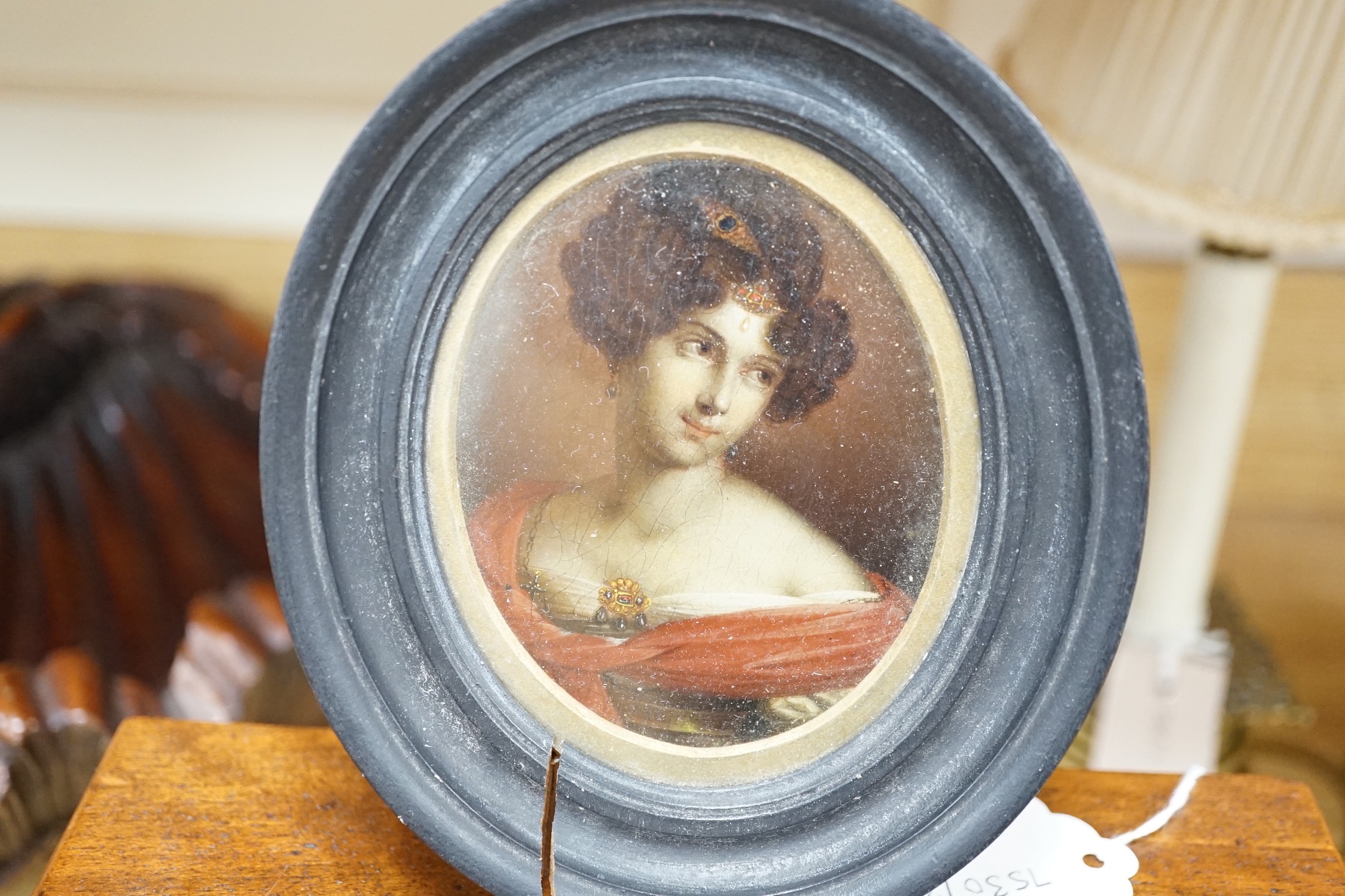 19th century Continental School, oil on panel, Miniature portrait of a lady, 9 x 7.5cm